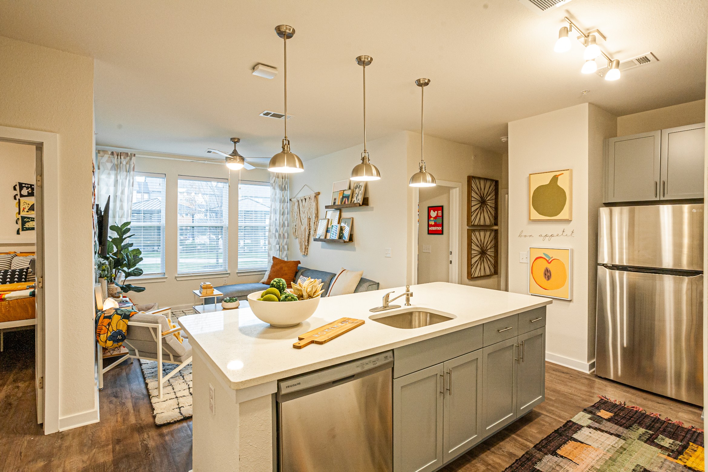 Kitchen with large island with dishwasher