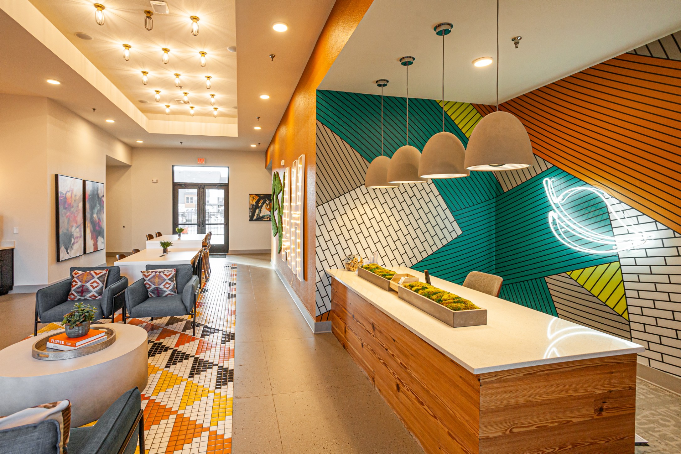 Lobby sitting area and front desk at The Tusk
