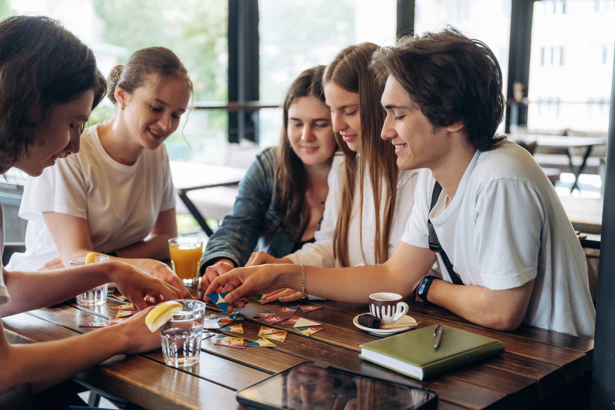 young adults playing board game